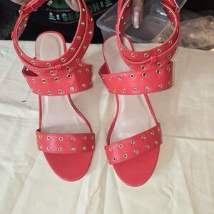 Elegant Red Sandals with Gold Details